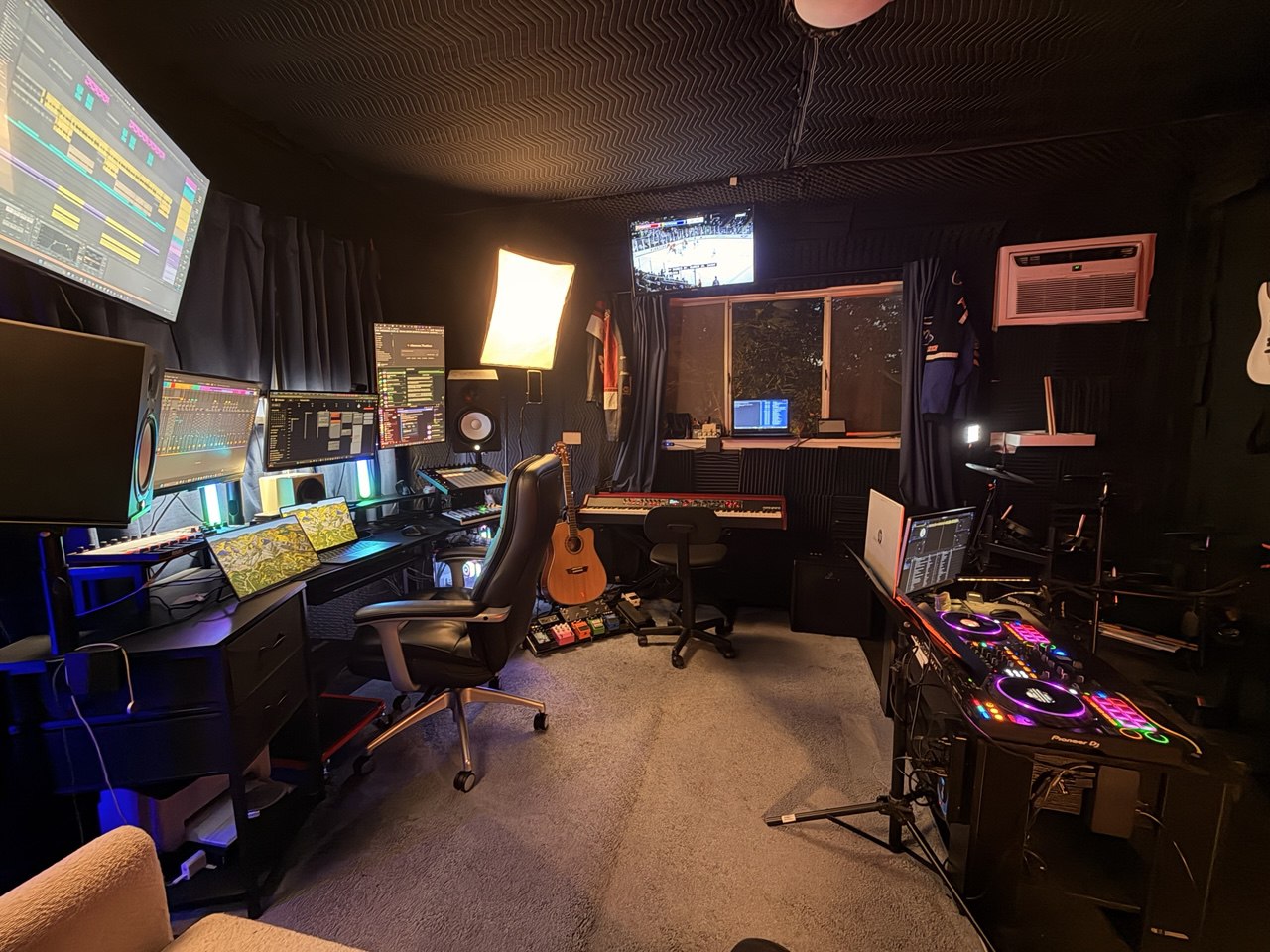 Music production studio in Los Angeles — multi-monitor Ableton setup, studio monitors, professional gear